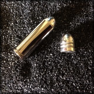 http://static.tvtropes.org/pmwiki/pub/images/45_colt_silver_bullet.jpg
