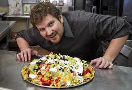 http://static.tvtropes.org/pmwiki/pub/images/tom_pizzica_got_his_own_show_called_outrageous_food_where_he_dares_people_to_eat_a_whole_buncha_crap_3613.jpg