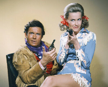 https://static.tvtropes.org/pmwiki/pub/images/cliff_robertson_and_dina_merrill_in_batman_western.jpg