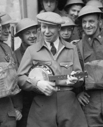 https://static.tvtropes.org/pmwiki/pub/images/george_formby_with_the_army_in_france_1940_cropped_35.jpg